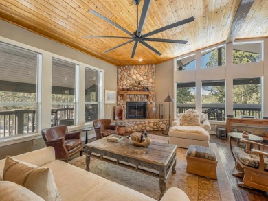 Nestled on an expansive 1.9-acre lot surrounded by whispering on Angel Fire Resort Country Club in New Mexico - for sale on GolfHomes.com, golf home, golf lot