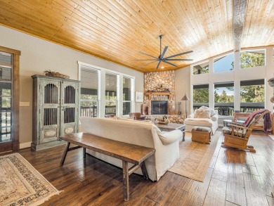 Nestled on an expansive 1.9-acre lot surrounded by whispering on Angel Fire Resort Country Club in New Mexico - for sale on GolfHomes.com, golf home, golf lot