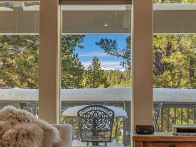Nestled on an expansive 1.9-acre lot surrounded by whispering on Angel Fire Resort Country Club in New Mexico - for sale on GolfHomes.com, golf home, golf lot