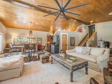 Nestled on an expansive 1.9-acre lot surrounded by whispering on Angel Fire Resort Country Club in New Mexico - for sale on GolfHomes.com, golf home, golf lot