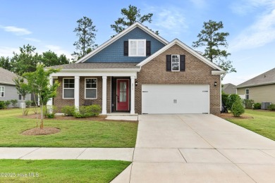 Welcome to a home where timeless elegance meets modern ease--The on Cape Fear National At Brunswick Forest in North Carolina - for sale on GolfHomes.com, golf home, golf lot