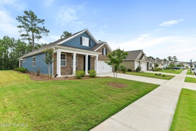 Welcome to a home where timeless elegance meets modern ease--The on Cape Fear National At Brunswick Forest in North Carolina - for sale on GolfHomes.com, golf home, golf lot