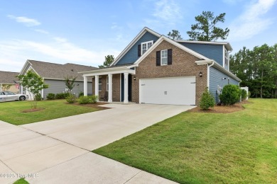 Welcome to a home where timeless elegance meets modern ease--The on Cape Fear National At Brunswick Forest in North Carolina - for sale on GolfHomes.com, golf home, golf lot