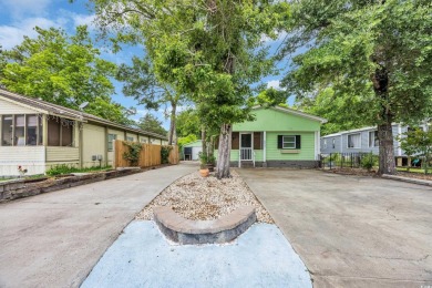 Located in the sought-after Creekside community in North Myrtle on Tidewater Golf Club and Plantation in South Carolina - for sale on GolfHomes.com, golf home, golf lot