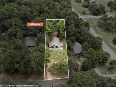 Welcome to your turn-key retreat in the heart of East Texas! on Holly Lake Ranch Golf Club in Texas - for sale on GolfHomes.com, golf home, golf lot