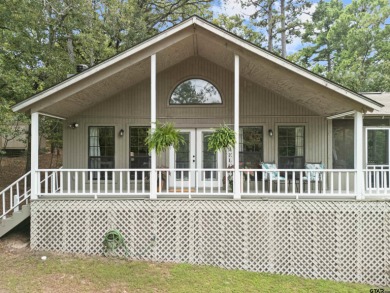 Welcome to your turn-key retreat in the heart of East Texas! on Holly Lake Ranch Golf Club in Texas - for sale on GolfHomes.com, golf home, golf lot