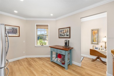 Priceless meadow views set the tone for this beautifully on Stone Creek Golf Club in Florida - for sale on GolfHomes.com, golf home, golf lot