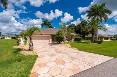 Some homes have rooms. This one has destinations-a kitchen built on Deep Creek Golf Club in Florida - for sale on GolfHomes.com, golf home, golf lot
