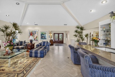 A beautiful Courtyard entrance and amazing 5 acre lake/golf on  in Florida - for sale on GolfHomes.com, golf home, golf lot