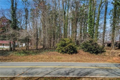 Build your dream home on this beautiful half-acre lot in the on Forest Oaks Country Club in North Carolina - for sale on GolfHomes.com, golf home, golf lot