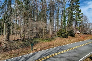 Build your dream home on this beautiful half-acre lot in the on Forest Oaks Country Club in North Carolina - for sale on GolfHomes.com, golf home, golf lot