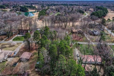 Build your dream home on this beautiful half-acre lot in the on Forest Oaks Country Club in North Carolina - for sale on GolfHomes.com, golf home, golf lot