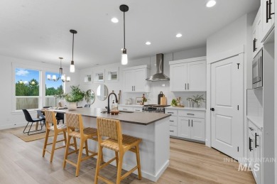Thoughtfully designed single-level floor plan offers 3 bedrooms on Hunters Point Golf Club in Idaho - for sale on GolfHomes.com, golf home, golf lot