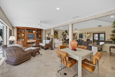A beautiful Courtyard entrance and amazing 5 acre lake/golf on  in Florida - for sale on GolfHomes.com, golf home, golf lot