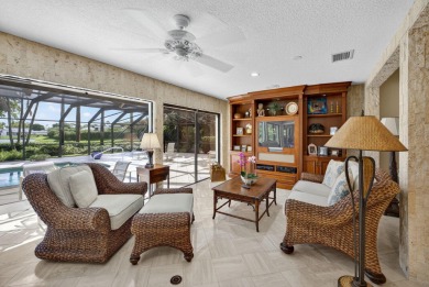 A beautiful Courtyard entrance and amazing 5 acre lake/golf on  in Florida - for sale on GolfHomes.com, golf home, golf lot