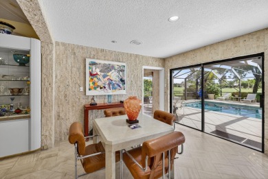 A beautiful Courtyard entrance and amazing 5 acre lake/golf on  in Florida - for sale on GolfHomes.com, golf home, golf lot