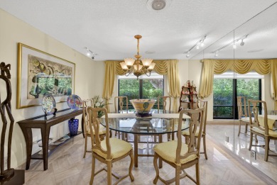 A beautiful Courtyard entrance and amazing 5 acre lake/golf on  in Florida - for sale on GolfHomes.com, golf home, golf lot