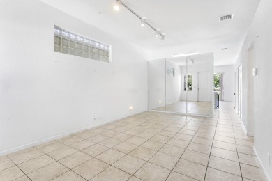 Exceptional opportunity to purchase this well-situated 3 bedroom on Village Golf Club in Florida - for sale on GolfHomes.com, golf home, golf lot