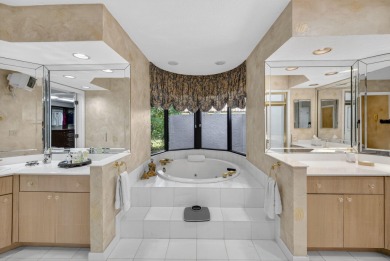 A beautiful Courtyard entrance and amazing 5 acre lake/golf on  in Florida - for sale on GolfHomes.com, golf home, golf lot