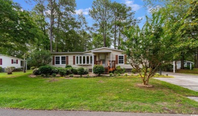 Welcome to 3093 Palmetto Drive, a beautifully updated 3-bedroom on Indigo Creek Golf Club in South Carolina - for sale on GolfHomes.com, golf home, golf lot