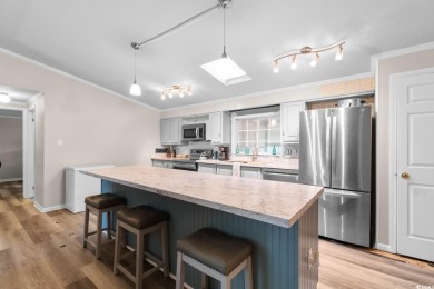 Welcome to 3093 Palmetto Drive, a beautifully updated 3-bedroom on Indigo Creek Golf Club in South Carolina - for sale on GolfHomes.com, golf home, golf lot