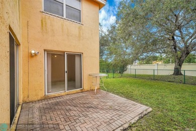 LARGE CORNER 3 BEDROOM 2.5 BATH HOME WITH LOFT  CAN BE 4TH on Inverrary Country Club in Florida - for sale on GolfHomes.com, golf home, golf lot