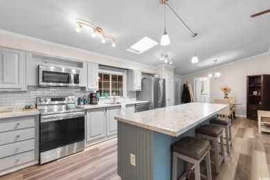 Welcome to 3093 Palmetto Drive, a beautifully updated 3-bedroom on Indigo Creek Golf Club in South Carolina - for sale on GolfHomes.com, golf home, golf lot