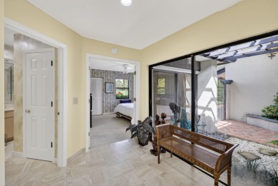 A beautiful Courtyard entrance and amazing 5 acre lake/golf on  in Florida - for sale on GolfHomes.com, golf home, golf lot