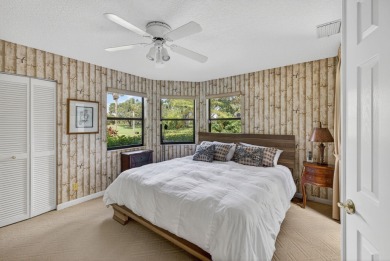 A beautiful Courtyard entrance and amazing 5 acre lake/golf on  in Florida - for sale on GolfHomes.com, golf home, golf lot