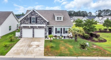 Step Into Coastal Luxury: Two Primary Suites, Two Fireplaces on International Club of Myrtle Beach in South Carolina - for sale on GolfHomes.com, golf home, golf lot