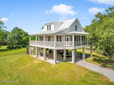Beautiful home with gorgeous views of the Bay of Saint Louis! on The Bridges Golf Club At Hollywood Casino in Mississippi - for sale on GolfHomes.com, golf home, golf lot