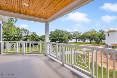 Beautiful home with gorgeous views of the Bay of Saint Louis! on The Bridges Golf Club At Hollywood Casino in Mississippi - for sale on GolfHomes.com, golf home, golf lot