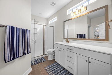 Step Into Coastal Luxury: Two Primary Suites, Two Fireplaces on International Club of Myrtle Beach in South Carolina - for sale on GolfHomes.com, golf home, golf lot