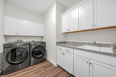 Step Into Coastal Luxury: Two Primary Suites, Two Fireplaces on International Club of Myrtle Beach in South Carolina - for sale on GolfHomes.com, golf home, golf lot
