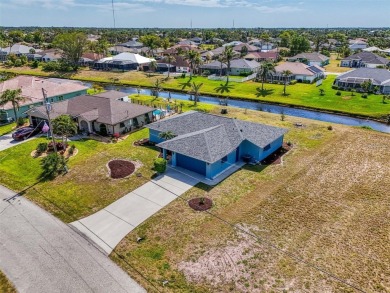 Charming 3-bedroom, 2-bathroom, canal-front home in the highly on Pinemoor West Golf Club in Florida - for sale on GolfHomes.com, golf home, golf lot