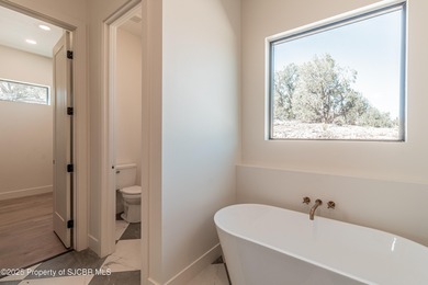 Brand New 2025 Build - Modern Elegance Meets Everyday Comfort on San Juan Country Club in New Mexico - for sale on GolfHomes.com, golf home, golf lot