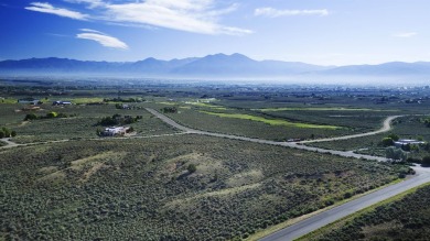 This beautiful 3-acre corner lot sits right between the 3rd on Taos Country Club in New Mexico - for sale on GolfHomes.com, golf home, golf lot