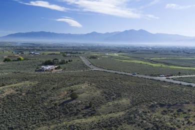 This beautiful 3-acre corner lot sits right between the 3rd on Taos Country Club in New Mexico - for sale on GolfHomes.com, golf home, golf lot