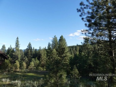 Nicely wooded lot with views to the west. Driveway is shared for on Meadowcreek Golf Resort in Idaho - for sale on GolfHomes.com, golf home, golf lot