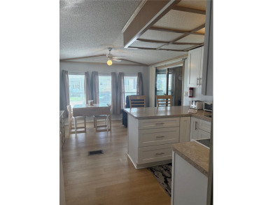 LOCATION, LOCATION, LOCATION!  This furnished doublewide home on Polo Park East in Florida - for sale on GolfHomes.com, golf home, golf lot