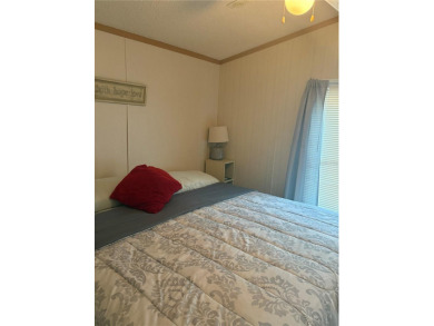 LOCATION, LOCATION, LOCATION!  This furnished doublewide home on Polo Park East in Florida - for sale on GolfHomes.com, golf home, golf lot