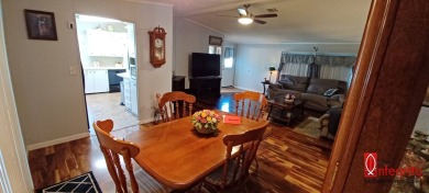 Come settle down and relax in a beautiful manufactured home with on Fairways Country Club in Florida - for sale on GolfHomes.com, golf home, golf lot