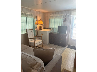 LOCATION, LOCATION, LOCATION!  This furnished doublewide home on Polo Park East in Florida - for sale on GolfHomes.com, golf home, golf lot