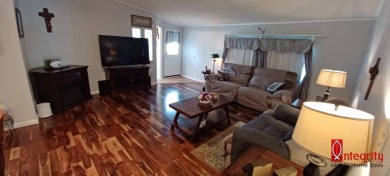 Come settle down and relax in a beautiful manufactured home with on Fairways Country Club in Florida - for sale on GolfHomes.com, golf home, golf lot