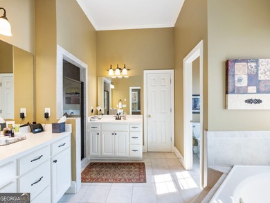 Nestled in the prestigious Windermere community, this on Windermere Golf Club in Georgia - for sale on GolfHomes.com, golf home, golf lot