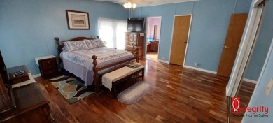 Come settle down and relax in a beautiful manufactured home with on Fairways Country Club in Florida - for sale on GolfHomes.com, golf home, golf lot