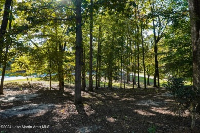 This 3 bedroom, 2 bath one level log home sits on a large flat on Stillwaters Golf and Country Club in Alabama - for sale on GolfHomes.com, golf home, golf lot