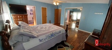 Come settle down and relax in a beautiful manufactured home with on Fairways Country Club in Florida - for sale on GolfHomes.com, golf home, golf lot