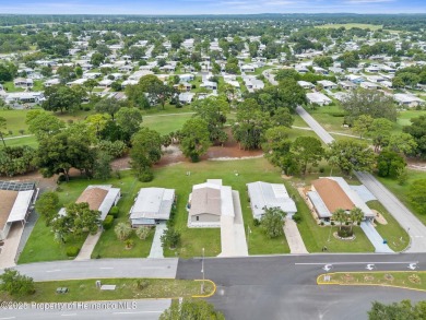 Welcome to this STUNNING and spacious open floor plan home on High Point Golf Club, Inc. in Florida - for sale on GolfHomes.com, golf home, golf lot