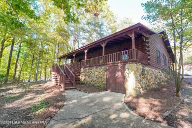 This 3 bedroom, 2 bath one level log home sits on a large flat on Stillwaters Golf and Country Club in Alabama - for sale on GolfHomes.com, golf home, golf lot